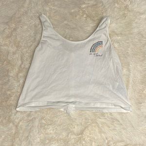 roxy tank top , white and has a saying in corner , buttoned up back